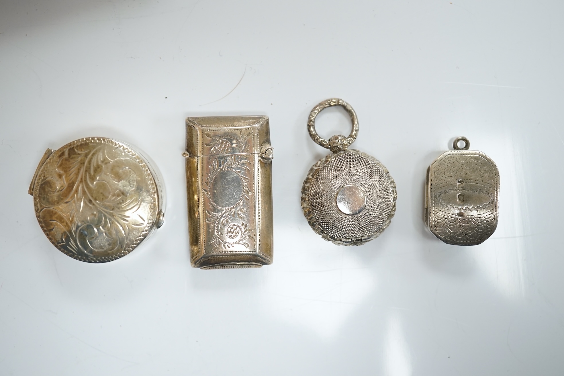 A George IV silver circular vinaigrette, Birmingham, 1822, 22mm and five other silver items including a mounted toilet jar and Victorian vinaigrette by George Unite. Condition - poor to fair